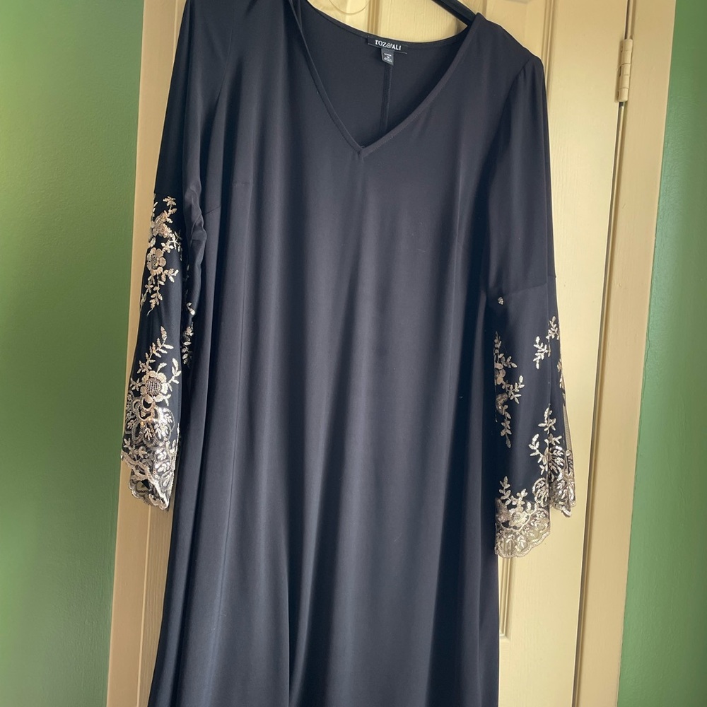 Elegant Black Dress with Embroidered Sleeves